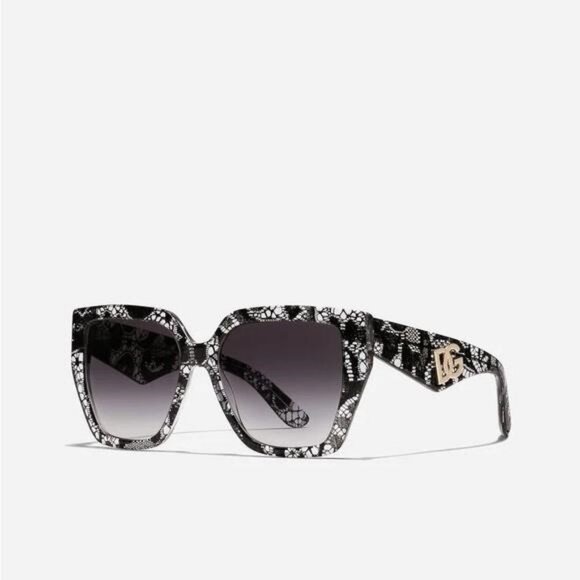 Dolce & Gabbana Women's iconic DG Crossed luxury Sunglasses